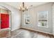 Bright dining room features hardwood floors and a chandelier at 2005 Isabela Ct, Summerville, SC 29483