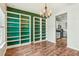 Bright dining room with hardwood floors and built-in shelving at 2005 Isabela Ct, Summerville, SC 29483