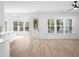 Bright living room with hardwood floors and access to back patio at 3893 James Bay Rd, Johns Island, SC 29455
