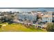 Aerial view of a building near the water, surrounded by other buildings and landscaping at 3 Chisolm St # 106, Charleston, SC 29401