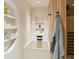 Modern bathroom with freestanding tub, wooden accents, and sauna at 3 Chisolm St # 106, Charleston, SC 29401