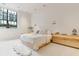 Spacious bedroom with light walls and large window at 3 Chisolm St # 106, Charleston, SC 29401