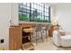 Custom kitchen island with pull-out drawers and cabinetry at 3 Chisolm St # 106, Charleston, SC 29401
