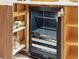 Close-up of wine cooler in custom cabinetry at 3 Chisolm St # 106, Charleston, SC 29401