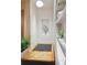 Modern laundry room with built-in shelving and plants at 3 Chisolm St # 106, Charleston, SC 29401