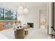 Bright living room with fireplace and open floor plan at 3 Chisolm St # 106, Charleston, SC 29401