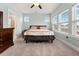 Primary bedroom with ceiling fan and ample natural light at 312 Parish Farms Dr, Summerville, SC 29486