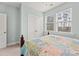 Guest bedroom with double bed, carpet, and large windows at 312 Parish Farms Dr, Summerville, SC 29486