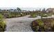 Scenic community garden with gravel paths, raised beds, and a charming fence, creating a tranquil outdoor space at 312 Parish Farms Dr, Summerville, SC 29486