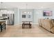 Bright dining area with wood table and bench seating at 312 Parish Farms Dr, Summerville, SC 29486