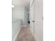 Light and airy hallway with carpeted floors at 312 Parish Farms Dr, Summerville, SC 29486