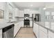 Kitchen with white cabinets, granite countertops, and stainless steel appliances at 312 Parish Farms Dr, Summerville, SC 29486