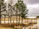 Quaint lakeside pavilion and bridge, serene community amenity at 312 Parish Farms Dr, Summerville, SC 29486