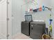 Laundry room with washer, dryer, and shelving at 312 Parish Farms Dr, Summerville, SC 29486