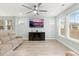 Spacious living room featuring a large TV and comfy sofas at 312 Parish Farms Dr, Summerville, SC 29486