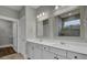 Double vanity, large mirror, and separate shower in this modern bathroom at 333 Dahlia Row Dr, Summerville, SC 29486