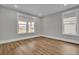 Spacious bedroom with hardwood floors and large windows at 333 Dahlia Row Dr, Summerville, SC 29486