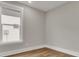 Bright bedroom with hardwood floors and a large window at 333 Dahlia Row Dr, Summerville, SC 29486