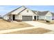 Craftsman style home with a two-car garage and brick accents at 333 Dahlia Row Dr, Summerville, SC 29486