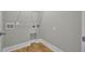 Convenient laundry room with hookups and built-in shelving at 333 Dahlia Row Dr, Summerville, SC 29486