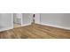 Hardwood floors and an open concept design are featured in this bright living room at 333 Dahlia Row Dr, Summerville, SC 29486