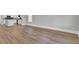Hardwood floors and open concept view into the kitchen at 333 Dahlia Row Dr, Summerville, SC 29486