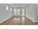 Bright and spacious living room with hardwood floors and large windows at 333 Dahlia Row Dr, Summerville, SC 29486