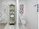 Bathroom with walk-in shower and marble finishes at 407 Yacht Harbor Ct, Isle of Palms, SC 29451
