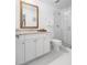 Clean bathroom with a large walk-in shower and granite vanity at 407 Yacht Harbor Ct, Isle of Palms, SC 29451