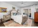 Bright bedroom with a comfortable bed and access to a private balcony at 407 Yacht Harbor Ct, Isle of Palms, SC 29451
