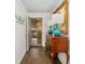 Inviting entryway with hardwood floors and antique console table at 407 Yacht Harbor Ct, Isle of Palms, SC 29451