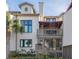 Charming two-story home with balcony and landscaped grounds at 407 Yacht Harbor Ct, Isle of Palms, SC 29451