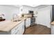 Updated kitchen with stainless steel appliances and granite countertops at 407 Yacht Harbor Ct, Isle of Palms, SC 29451