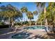 Community pool and hot tub with lounge chairs at 407 Yacht Harbor Ct, Isle of Palms, SC 29451