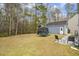 Large backyard with playset, trampoline, and storage shed at 4822 Cane Pole Ln, Summerville, SC 29485