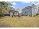 Spacious backyard, perfect for , with playset and trampoline at 4822 Cane Pole Ln, Summerville, SC 29485