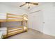 bedroom with a wooden bunk bed and ample closet space at 4822 Cane Pole Ln, Summerville, SC 29485