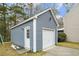 Detached garage with white door at 4822 Cane Pole Ln, Summerville, SC 29485