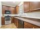 Kitchen with wood cabinets, stainless steel appliances, and granite countertops at 4822 Cane Pole Ln, Summerville, SC 29485