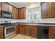 Kitchen with wood cabinets and stainless steel appliances at 4822 Cane Pole Ln, Summerville, SC 29485