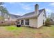 House exterior showcasing backyard patio at 4845 Carnoustie Ct, Summerville, SC 29485