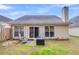 House back exterior view with patio and yard at 4845 Carnoustie Ct, Summerville, SC 29485