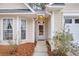Welcoming front entrance with a glass door and sidelights at 4845 Carnoustie Ct, Summerville, SC 29485