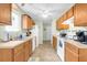 Well-equipped kitchen with wood cabinets and appliances at 4845 Carnoustie Ct, Summerville, SC 29485