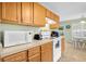 Kitchen features stove, microwave, and counter space at 4845 Carnoustie Ct, Summerville, SC 29485