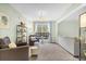 Comfortable living room with armchairs, neutral decor, and natural light at 4845 Carnoustie Ct, Summerville, SC 29485