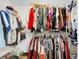 Large walk-in closet with clothing racks and shelving at 4845 Carnoustie Ct, Summerville, SC 29485