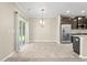 Dining area with tile floor and access to the backyard at 5440 Overland Trl, North Charleston, SC 29420