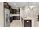 Modern kitchen features stainless steel appliances and granite countertops at 5440 Overland Trl, North Charleston, SC 29420