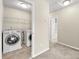 Convenient laundry room with washer and dryer included at 5440 Overland Trl, North Charleston, SC 29420